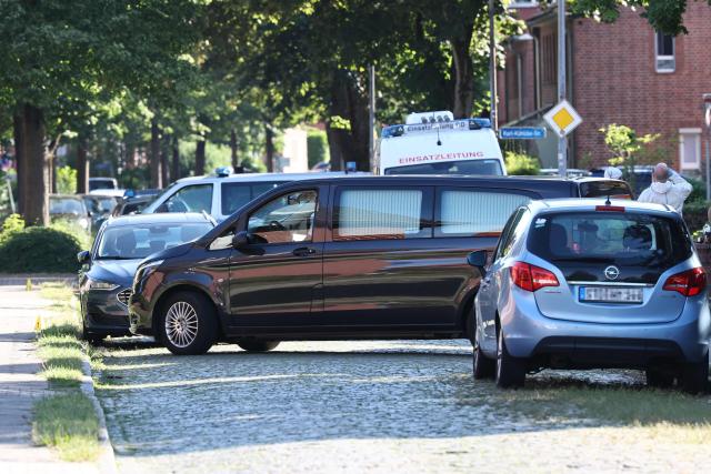 A hearse is pictured at the scene where six people were killed in a shooting in Stade, northern Germany, a city some 50 kilometres west of Hamburg, on June 29, 2026. (Photo by Ibrahim OT / AFP)