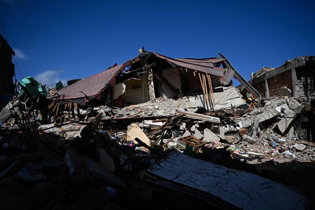 View of rubble in El Junquito, Venezuela on June 29, 2026, after twin earthquakes. Hopes were fading on June 29, 2026 of finding survivors more than four days after powerful twin earthquakes struck Venezuela, as residents grow increasingly frustrated with the government's response to the disaster that has killed at least 1,450 people and left tens of thousands unaccounted for. (Photo by Federico PARRA / AFP)