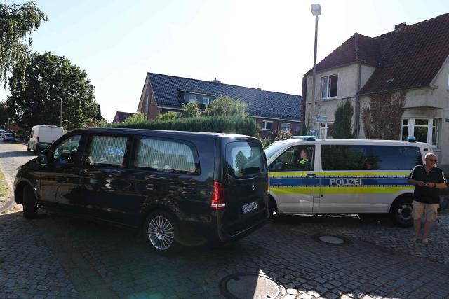 A hearse is pictured at the scene where six people were killed in a shooting in Stade, northern Germany, a city some 50 kilometres west of Hamburg, on June 29, 2026. (Photo by Ibrahim OT / AFP)