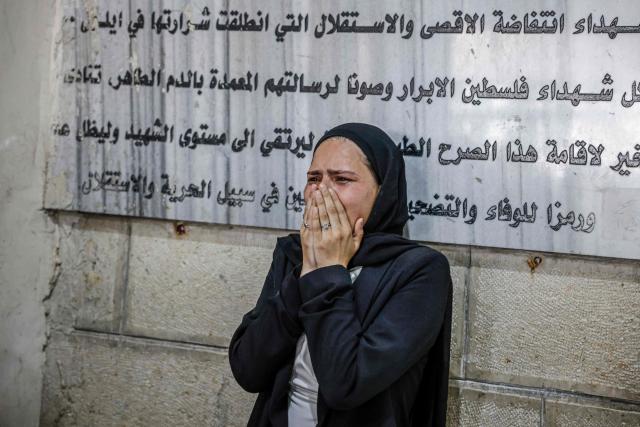 A relative mourns the death of Amir Ahmad Jawad Jaber, a Palestinian teenager who was killed during an Israeli raid, at a hospital in Ramallah, in the Israeli-occupied West Bank on June 29, 2026. Israeli forces fatally shot a 15-year-old Palestinian teenager during a raid in the occupied West Bank on June 29, the Palestinian health ministry said, as violence surges in the Israeli-occupied territory. (Photo by Zain JAAFAR / AFP)