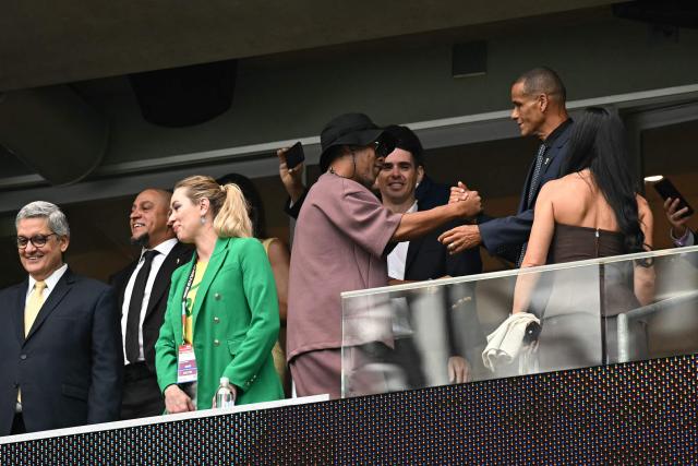 Brazilian former football players Ronaldinho (C), Rivaldo (R) and Roberto Carlos (2nd L) attend the 2026 World Cup round of 32 football match between Brazil and Japan at the Houston Stadium in Houston on June 29, 2026.  (Photo by Paul ELLIS / AFP)