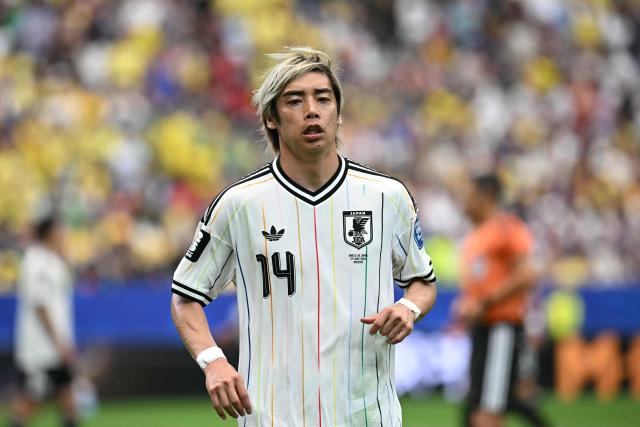 Japan's midfielder #14 Junya Ito reacts  during the 2026 World Cup round of 32 football match between Brazil and Japan at the Houston Stadium in Houston on June 29, 2026.  (Photo by Paul ELLIS / AFP)