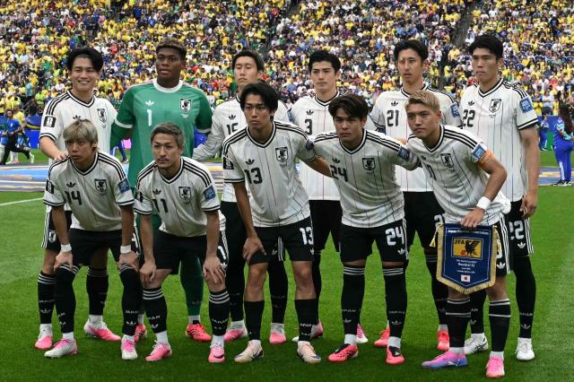 Japan's players pose ahead of the 2026 World Cup round of 32 football match between Brazil and Japan at the Houston Stadium in Houston on June 29, 2026.  (Photo by RONALDO SCHEMIDT / AFP)