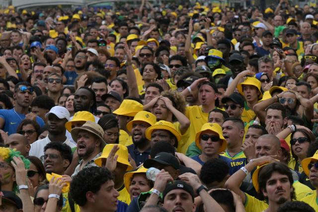 Brazilian fans watch the live broadcast of the 2026 World Cup football match between Brazil and Japan at the Anhangabau Fan Zone in Sao Paulo, Brazil, on June 29, 2026. (Photo by NELSON ALMEIDA / AFP)