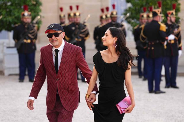 French fashion designer Christian Louboutin (L) arrives at The Elysee Presidential Palace for a working dinner with France's President and Thailand's King Maha Vajiralongkorn as part of the Thai King's State visit to France, in Paris on June 29, 2026. (Photo by Dimitar DILKOFF / AFP)
