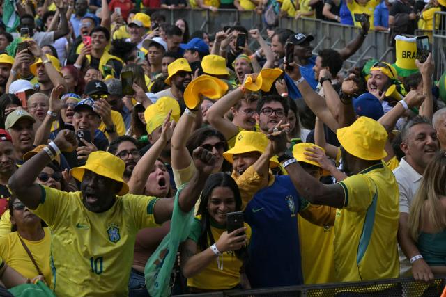 Brazilian fans watch the live broadcast of the 2026 World Cup football match between Brazil and Japan at the Anhangabau Fan Zone in Sao Paulo, Brazil, on June 29, 2026. (Photo by NELSON ALMEIDA / AFP)
