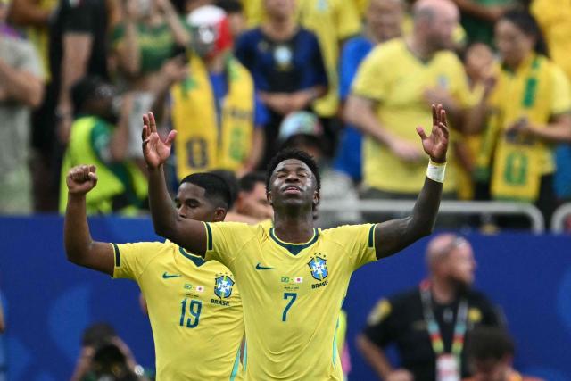 Brazil's forward #07 Vinicius Junior celebrates his team's second goal during the 2026 World Cup round of 32 football match between Brazil and Japan at the Houston Stadium in Houston on June 29, 2026.  (Photo by RONALDO SCHEMIDT / AFP)