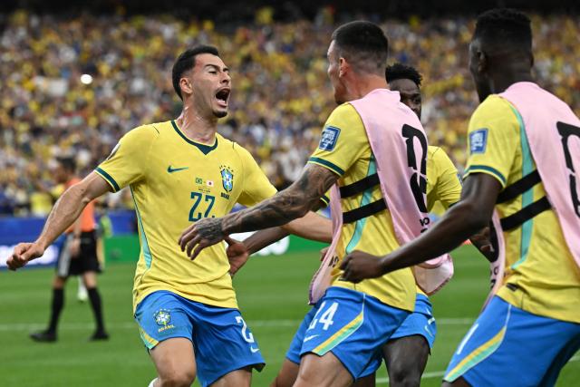 Brazil's forward #22 Gabriel Martinelli (L) celebrates with teammates after scoring his team's second goal during the 2026 World Cup round of 32 football match between Brazil and Japan at the Houston Stadium in Houston on June 29, 2026.  (Photo by Paul ELLIS / AFP)
