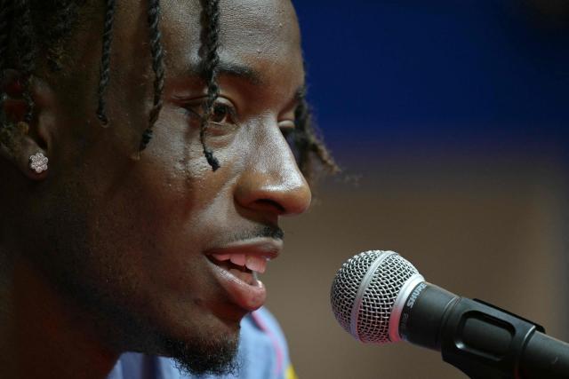 England's forward #20 Noni Madueke gives a press conference ahead of the team's 2026 World Cup football tournament round of 32 match against Democratic Republic of Congo at KC Parks in Kansas City on June 29, 2026. (Photo by JUAN MABROMATA / AFP)