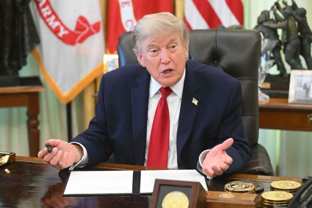 US President Donald Trump speaks after signing a presidential memo on pollution control in vehicles at the Oval Office of the White House in Washington, DC, on June 29, 2026. (Photo by SAUL LOEB / AFP)