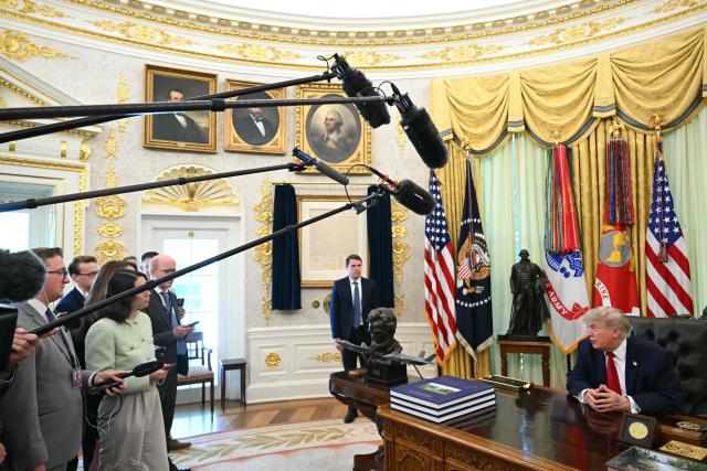 US President Donald Trump speaks with reporters after signing a presidential memo on pollution control in vehicles at the Oval Office of the White House in Washington, DC, on June 29, 2026. (Photo by SAUL LOEB / AFP)