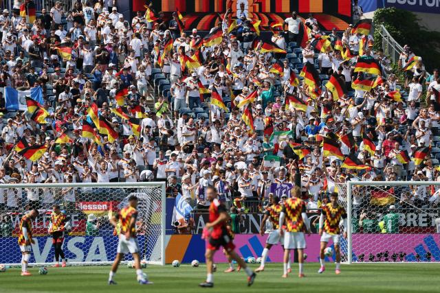 German fans cheer for their team as Germany's players warm up ahead of the 2026 World Cup round of 32 football match between Germany and Paraguay at the Boston Stadium in Foxborough on June 29, 2026.  (Photo by Odd ANDERSEN / AFP)