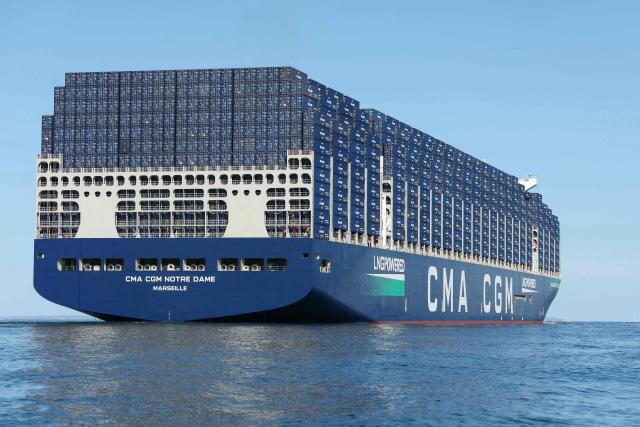 CMA-CMG container ship the 'Notre Dame', France's largest container ship, approaches the northern port of Le Havre on June 29, 2026. (Photo by ALAIN JOCARD / AFP)
