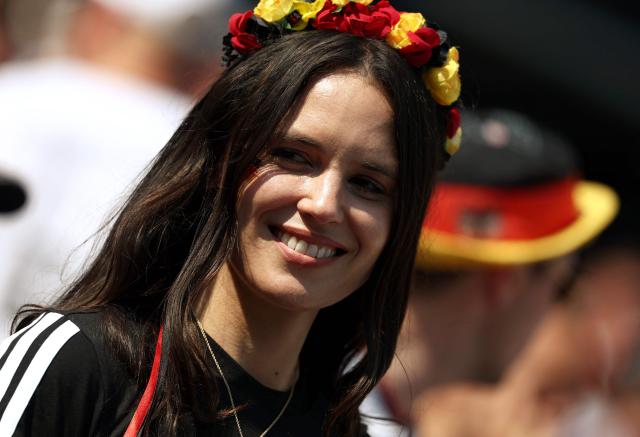 A German fan smiles ahead of the 2026 World Cup round of 32 football match between Germany and Paraguay at the Boston Stadium in Foxborough on June 29, 2026.  (Photo by FRANCK FIFE / AFP)