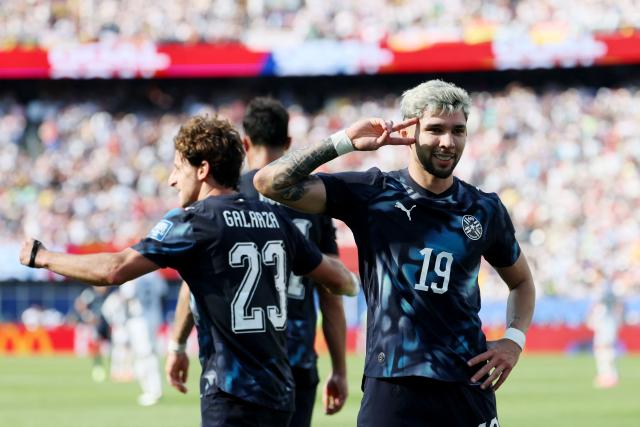 Paraguay's midfielder #19 Julio Enciso celebrates scoring his team's first goal during the 2026 World Cup round of 32 football match between Germany and Paraguay at the Boston Stadium in Foxborough on June 29, 2026.  (Photo by Odd ANDERSEN / AFP)