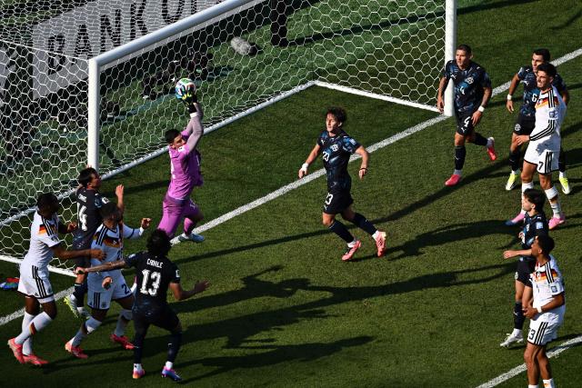 Paraguay's goalkeeper #12 Orlando Gill makes a save during the 2026 World Cup round of 32 football match between Germany and Paraguay at the Boston Stadium in Foxborough on June 29, 2026.  (Photo by Jewel SAMAD / AFP)