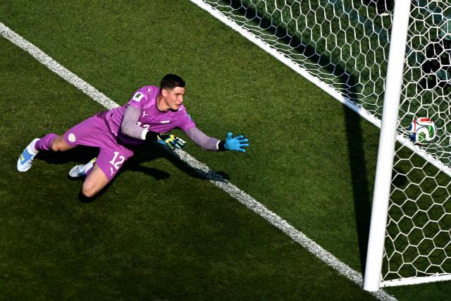 Paraguay's goalkeeper #12 Orlando Gill concedes Germany's first goal scored by forward #07 Kai Havertz (unseen) during the 2026 World Cup round of 32 football match between Germany and Paraguay at the Boston Stadium in Foxborough on June 29, 2026.  (Photo by Jewel SAMAD / AFP)