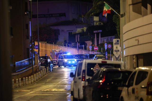 This photograph shows a police car behind a security perimeter on a street following an explosion that occurred in a residential building in Monaco, near the border with France on June 29, 2026. Three people were injured — two of them very seriously — in the explosion of an explosive device in Monaco in the evening. The blast at a residential building was "very likely an attack", Monaco's Minister of State (head of government) told AFP. Public prosecutor said a suspect had left a bag or package in the building's lobby before leaving. Nothing appeared for the moment to indicate why the building might have been targeted, he said. (Photo by Valery HACHE / AFP)
