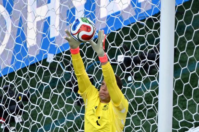 Germany's goalkeeper #01 Manuel Neuer grabs the ball during the 2026 World Cup round of 32 football match between Germany and Paraguay at the Boston Stadium in Foxborough on June 29, 2026.  (Photo by Jewel SAMAD / AFP)