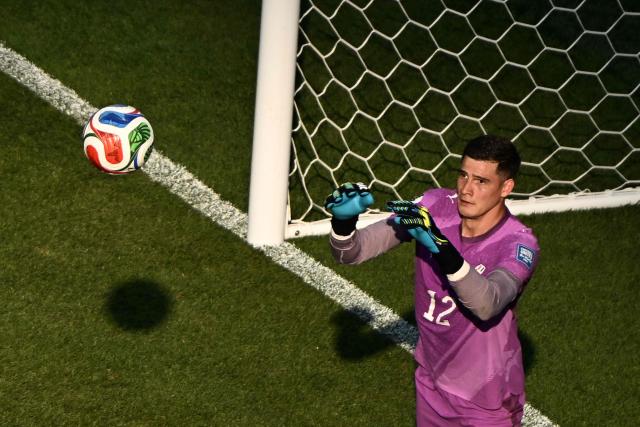 Paraguay's goalkeeper #12 Orlando Gill grabs the ball during the 2026 World Cup round of 32 football match between Germany and Paraguay at the Boston Stadium in Foxborough on June 29, 2026.  (Photo by Jewel SAMAD / AFP)