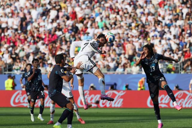 Germany's forward #07 Kai Havertz heads the ball and misses a chance past Paraguay's defender #13 Jose Canale during the 2026 World Cup round of 32 football match between Germany and Paraguay at the Boston Stadium in Foxborough on June 29, 2026.  (Photo by Odd ANDERSEN / AFP)