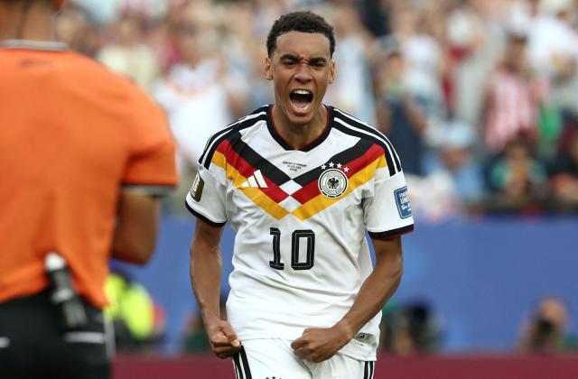 Germany's midfielder #10 Jamal Musiala reacts after scoring his penalty during the penalty shootout of the 2026 World Cup round of 32 football match between Germany and Paraguay at the Boston Stadium in Foxborough on June 29, 2026.  (Photo by FRANCK FIFE / AFP)