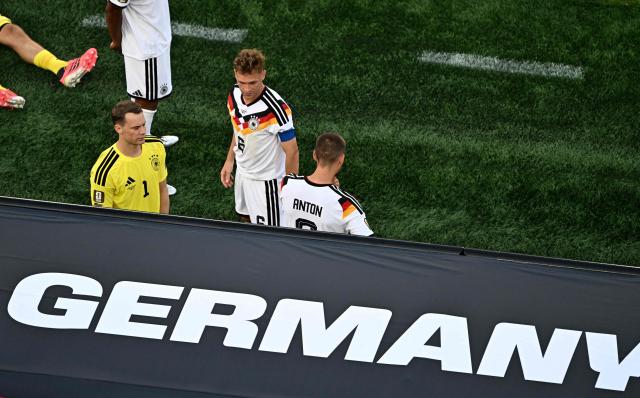 Germany's goalkeeper #01 Manuel Neuer, defender #06 Joshua Kimmich, and defender #03 Waldemar Anton react after losing the penalty shootout of the 2026 World Cup round of 32 football match between Germany and Paraguay at the Boston Stadium in Foxborough on June 29, 2026.  (Photo by Jewel SAMAD / AFP)