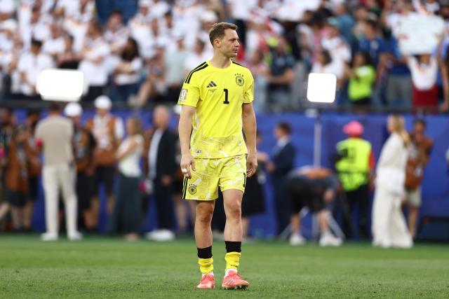 Germany's goalkeeper #01 Manuel Neuer reacts after losing the penalty shootout of the 2026 World Cup round of 32 football match between Germany and Paraguay at the Boston Stadium in Foxborough on June 29, 2026.  (Photo by CHARLY TRIBALLEAU / AFP)