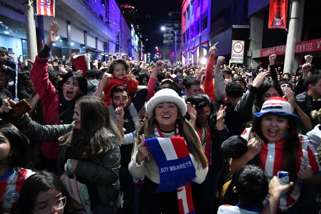 Paraguayan fans celebrate after their team defeated Germany in the penalty shootout of the 2026 FIFA World Cup round of 32 football match between Germany and Paraguay, in Asuncion on June 29, 2026. (Photo by DANIEL DUARTE / AFP)