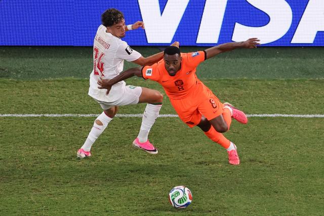 Morocco's midfielder #24 Neil El Aynaoui and Netherlands' midfielder #08 Ryan Gravenberch fight for the ball during the 2026 World Cup round of 32 football match between the Netherlands and Morocco at the Monterrey Stadium in Guadalupe on June 29, 2026.  (Photo by Julio Cesar AGUILAR / AFP)