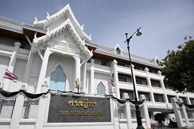 Thailand's Supreme Court is pictured after the first hearing of an ethics case involving 44 former and current Move Forward Party MPs in Bangkok on June 30, 2026, after they are accused of serious ethical violations by the National Anti-Corruption Commission (NACC) for supporting a 2021 bill to amend the lese majeste law, or Article 112, of the Criminal Code. (Photo by Lillian SUWANRUMPHA / AFP)