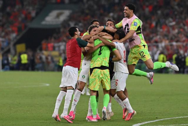 TOPSHOT - Morocco's players celebrate after winning in the shootout during the 2026 World Cup round of 32 football match between the Netherlands and Morocco at the Monterrey Stadium in Guadalupe on June 29, 2026.  (Photo by CARL DE SOUZA / AFP)
