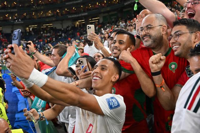 TOPSHOT - Morocco forward #09 Soufiane Rahimi celebrates with fans after winning in the shootout during the 2026 World Cup round of 32 football match between the Netherlands and Morocco at the Monterrey Stadium in Guadalupe on June 29, 2026.  (Photo by CARL DE SOUZA / AFP)