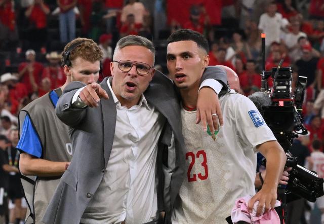 Morocco's head coach Mohamed Ouahbi celebrates with his midfielder #23 Bilal El Khannouss  after winning the penalty shootout of the 2026 World Cup round of 32 football match between the Netherlands and Morocco at the Monterrey Stadium in Guadalupe on June 29, 2026.  (Photo by CARL DE SOUZA / AFP)