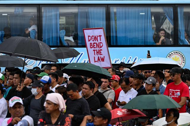 Members of the religious group Iglesia ni Cristo (INC) stage a demonstration along Epifanio de los Santos Avenue in Quezon City, Metro Manila on June 30, 2026. Thousands of members of a powerful Philippine religious sect rallied in Manila, snarling rush hour traffic for kilometres in every direction as they protested the looming arrest of a senator and church member. (Photo by Jam STA ROSA / AFP)