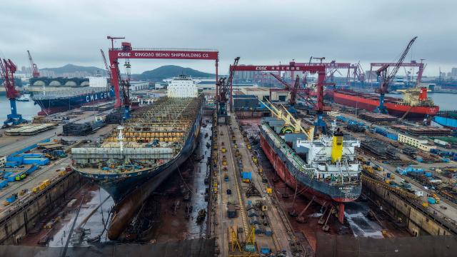 This aerial photo shows the Qingdao Beihai Shipyard in Qingdao, China’s eastern Shandong province on June 30, 2026. (Photo by CN-STR / AFP) / China OUT