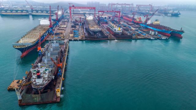 This aerial photo shows the Qingdao Beihai Shipyard in Qingdao, China’s eastern Shandong province on June 30, 2026. (Photo by CN-STR / AFP) / China OUT