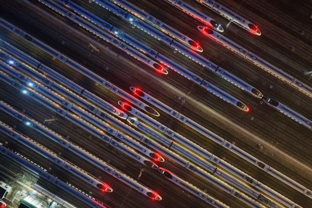 This aerial photo shows high-speed trains at Nanjing South High-Speed Train Depot, in China’s eastern Jiangsu province on June 30, 2026. (Photo by CN-STR / AFP) / China OUT