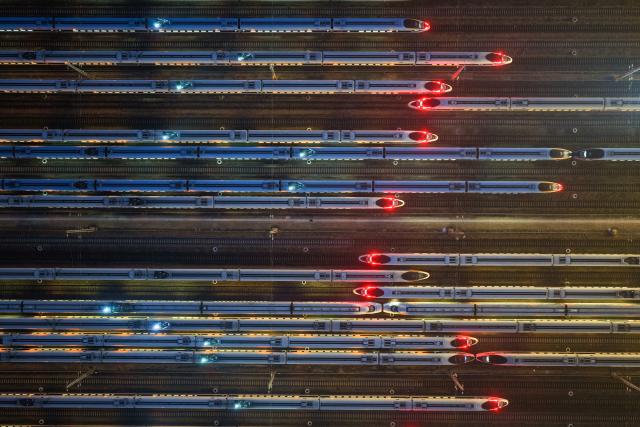 This aerial photo shows high-speed trains at Nanjing South High-Speed Train Depot, in China’s eastern Jiangsu province on June 30, 2026. (Photo by CN-STR / AFP) / China OUT