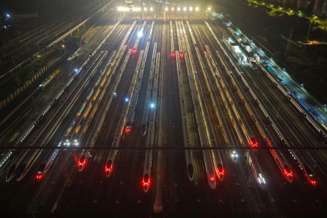 This aerial photo shows high-speed trains at Nanjing South High-Speed Train Depot, in China’s eastern Jiangsu province on June 30, 2026. (Photo by CN-STR / AFP) / China OUT
