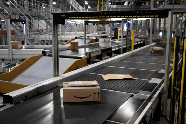 (FILES) This photograph shows parcels at a Collissimo platform in Le Thillay, Paris' suburb, on December 5, 2024. The French tax of two euros on small packages, introduced in March but circumvented by Asian platforms, will be “suspended” on June 31, 2026, the day a three-euro European customs duty—to which it was originally intended to be added—takes effect, the French government announced to AFP. (Photo by Grйgoire CAMPIONE / AFP)