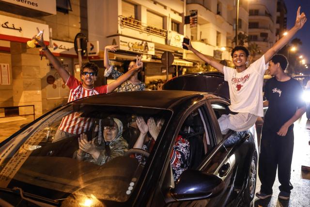 Football fans celebrate Morocco's victory over the Netherlands in the Round of 32 of the 2026 World Cup, in Rabat early on June 30, 2026. Morocco defeated the Netherlands in a penalty shoot-out to advance to the last 16 of the World Cup on June 29 after a thrilling battle in Monterrey finished 1-1 after extra-time. (Photo by Abdel Majid BZIOUAT / AFP)