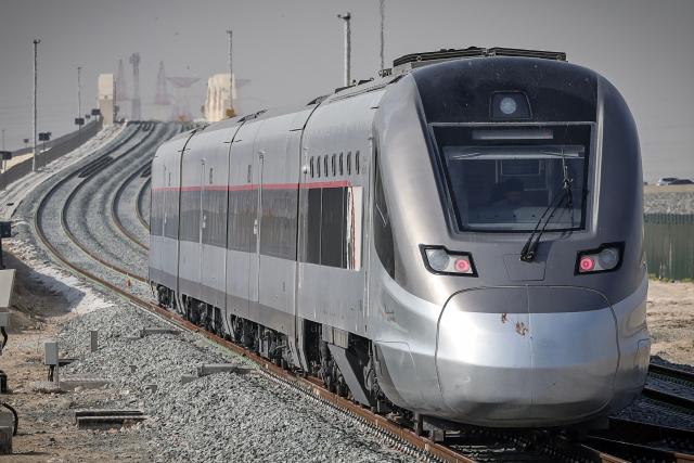 A photograph shows an Etihad Rail train, the UAE's first passenger train, on its inaugural journey at Mohamed bin Zayed City station in Abu Dhabi on June 30, 2026. The passenger service will eventually connect four of the country's seven emirates, with an "introductory operational phase" between Abu Dhabi and Fujairah to begin on June 30, state news agency WAM said earlier this month. The Dubai station will open on September 30, while the main station in the neighbouring emirate of Sharjah is set to be operational on March 30, 2027. (Photo by FADEL SENNA / AFP)