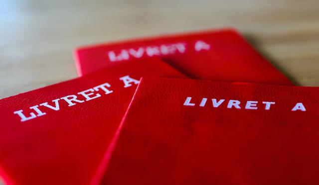 (FILES) A picture taken on August 24, 2015 in Lille shows Livret A savings books. The interest rate on savings held in Livret A accounts “will increase” in mid-July, Economy Minister announced on June 30, 2026 in an interview with the regional daily La Provence, though he did not specify the rate. (Photo by Denis CHARLET / AFP)