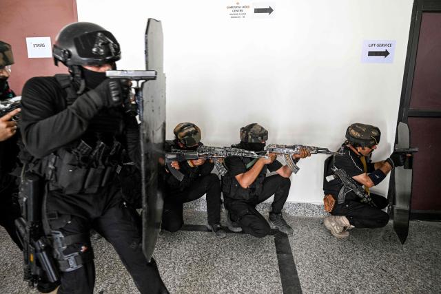 Special Operations Group (SOG) personnel of Jammu and Kashmir police take part in a mock security drill ahead of the annual Hindu pilgrimage Amarnath Yatra, on the outskirts of Srinagar on June 30, 2026. (Photo by Tauseef MUSTAFA / AFP)