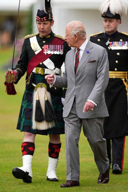 Britain's King Charles III (C) attends the traditional "Ceremony of the Keys" in the Gardens of the Palace of Holyroodhouse in Edinburgh, Scotland on June 30, 2026, on the first day of the king and queen's visit to Scotland. (Photo by Aaron Chown / POOL / AFP)