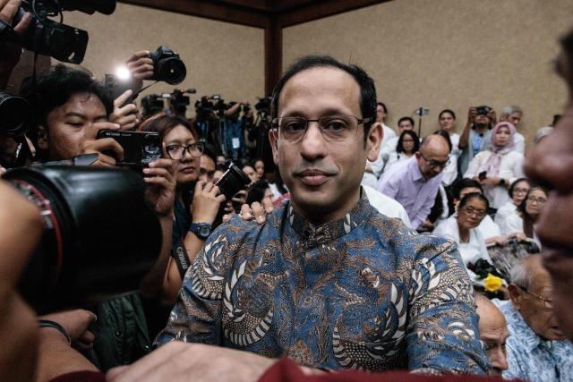 Nadiem Makarim, Indonesia's former education minister and co-founder of ride hailing company Gojek, waits for a verdict hearing at the Central Jakarta District Court in Jakarta on June 30, 2026, in a corruption case related to the procurement of Chromebook laptops for schools during the Covid-19 pandemic. Judges found him guilty of corruption, sentencing him to 10 years in prison. The court also ordered Nadiem to pay a fine of 1 billion rupiah ($55,850) and 809 billion rupiah (more than $45 million) in restitution, or serve an additional prison term. (Photo by YASUYOSHI CHIBA / AFP)
