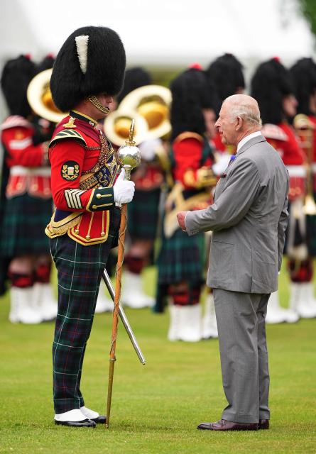 Britain's King Charles III (R) attends the traditional "Ceremony of the Keys" in the Gardens of the Palace of Holyroodhouse in Edinburgh, Scotland on June 30, 2026, on the first day of the king and queen's visit to Scotland. (Photo by Aaron Chown / POOL / AFP)