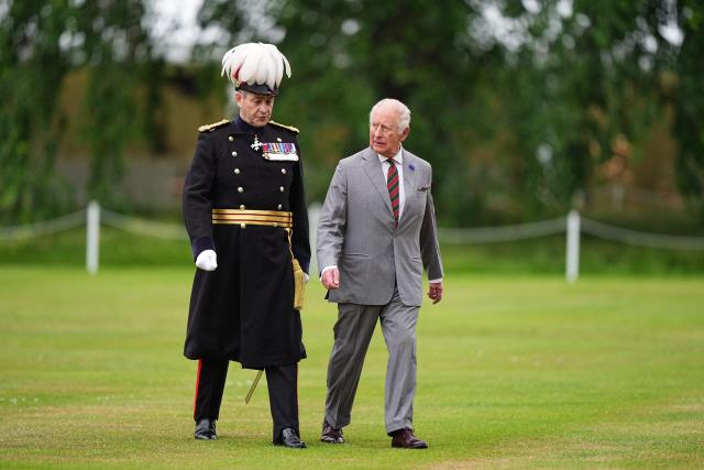Britain's King Charles III (R) attends the traditional "Ceremony of the Keys" in the Gardens of the Palace of Holyroodhouse in Edinburgh, Scotland on June 30, 2026, on the first day of the king and queen's visit to Scotland. (Photo by Aaron Chown / POOL / AFP)