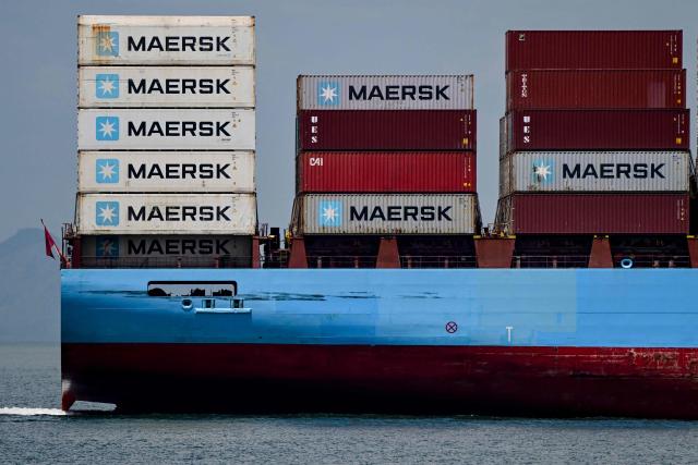 (FILES) A cargo ship carrying containers from the Danish company Maersk sails into the Pacific entrance of the Panama Canal in Panama City on April 21, 2026. Danish global shipping giant Maersk expects its full-year earnings to be at least $1 billion higher than previously anticipated due to strong demand from the Far East ahead of new US tariffs. The company said late Monday (June 29, 2026) that its underlying earnings before interest, taxes, depreciation and amortisation (EBITDA) would likely reach $8-10 billion in 2026, compared to its previous forecast of $4.5-7 billion. (Photo by MARTIN BERNETTI / AFP)